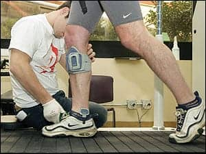 Morrow works out on a treadmill system