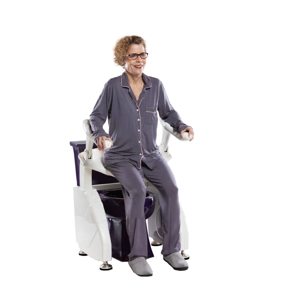 woman using Dignity Lifts DL2 toilet lift